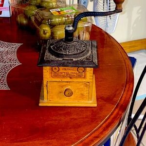 Colonial coffee mill coffee grinder wood and cast iron.